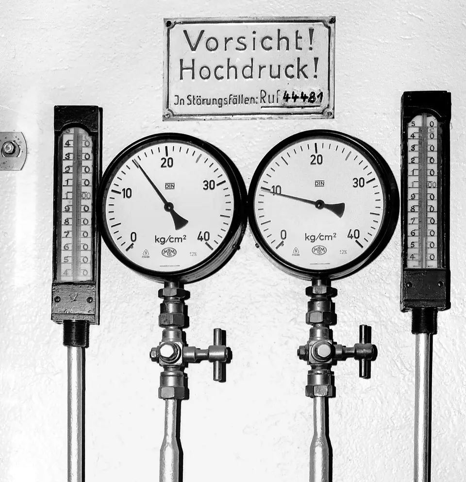 Mechanical room with boiler and heating pipes