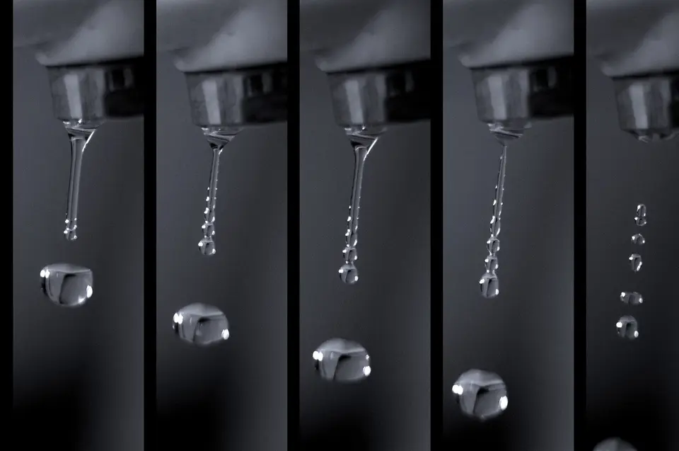 Plumbing leak — dripping water from a fixture