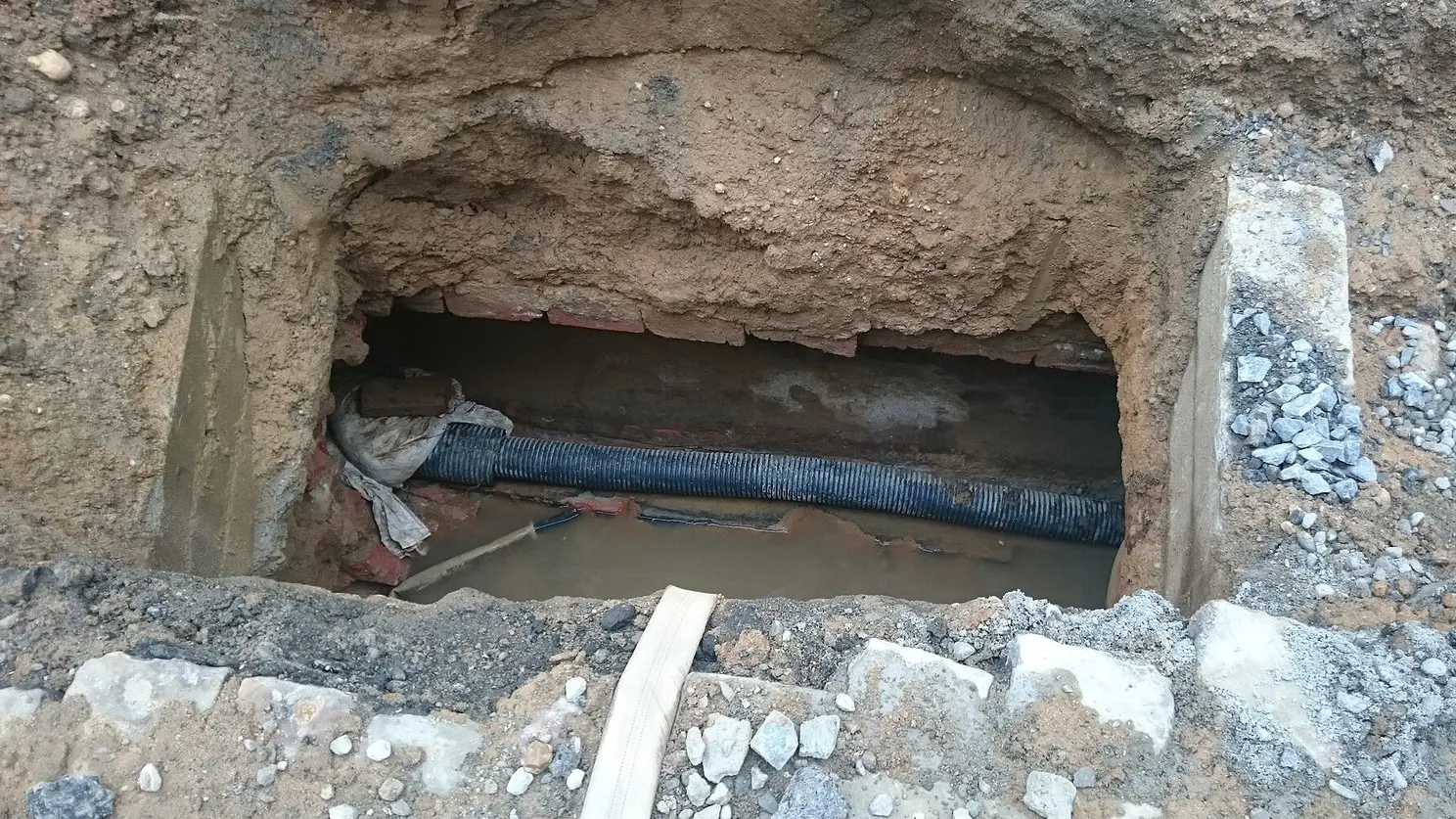 Water line work at the street — trench and mains