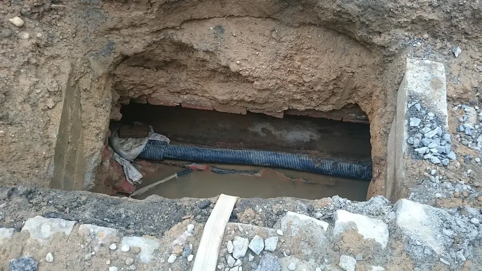 Water line work at the street — trench and mains